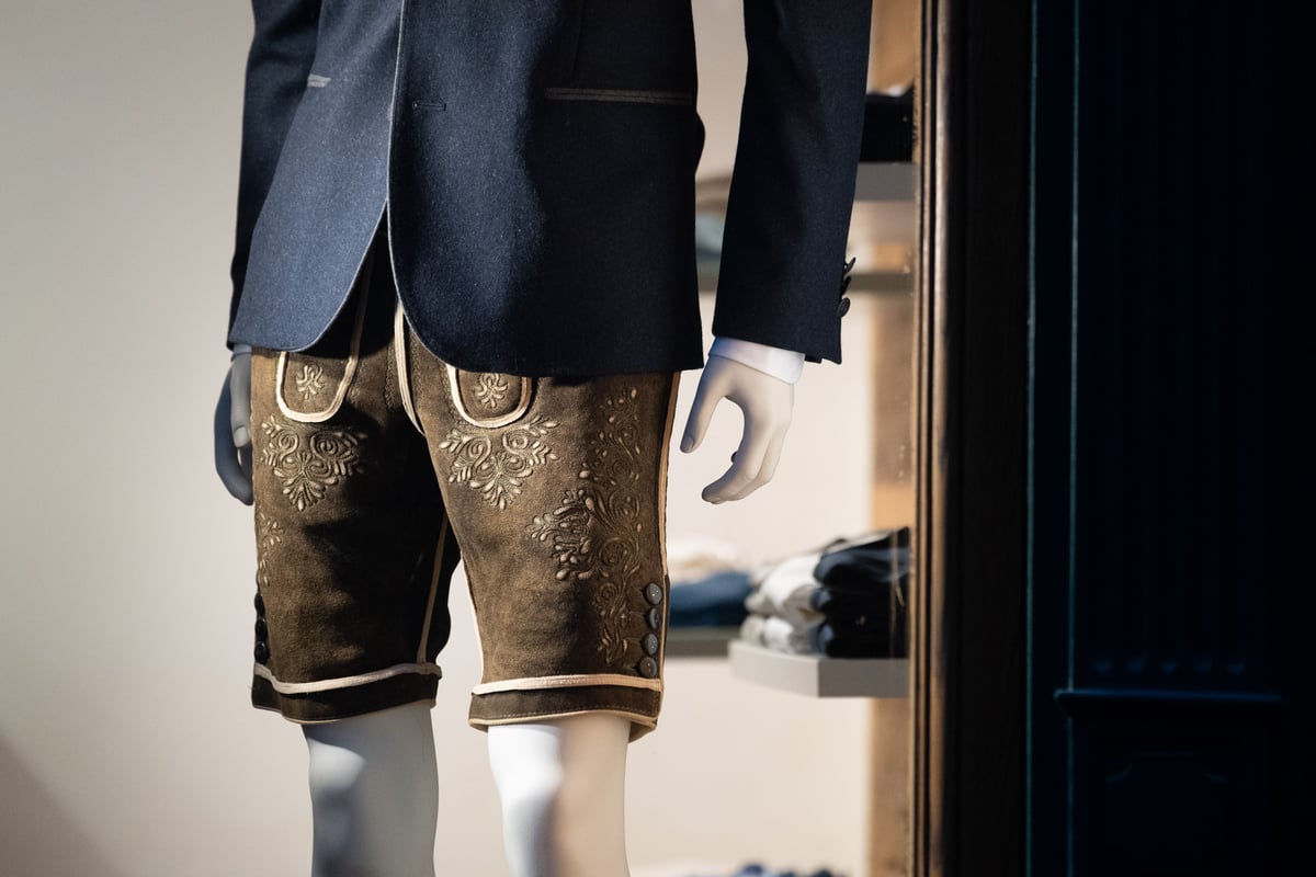 Embroidered leather Lederhosen on a mannequin in a traditional dirndl and tracht shop in Salzburg
