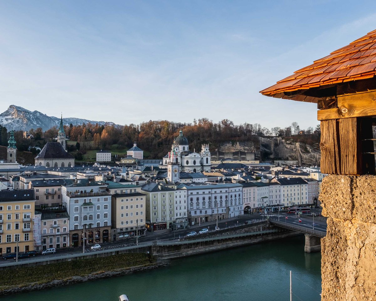 View of Salzburg old town with Kollegienkirche and Staatsbrücke from Hettwer Bastei wooden shelter on Kapuzinerberg