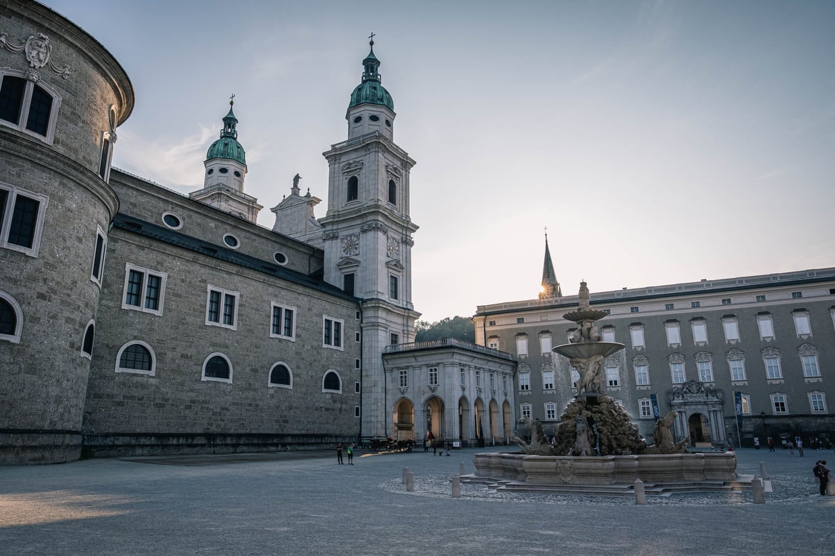 The Residenzbrunnen on Residenzplatz with the Cathedral behind it