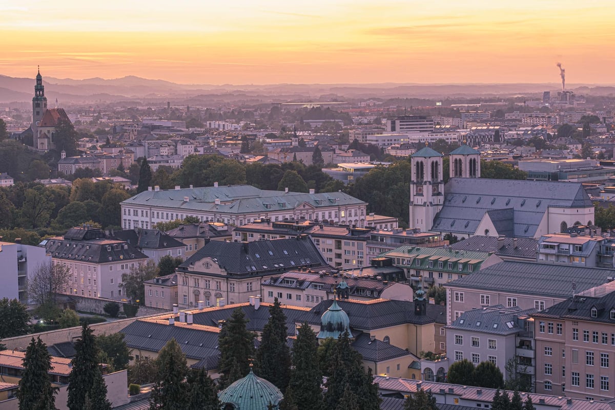 Salzburg Neustadt panorama with Mulln Church and Andrakirche at sunset from Kapuzinerberg