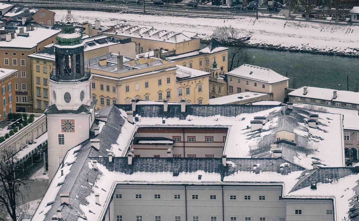 View of the Salzburg Altstadt rooftops and Salzach river from the Neue Residenz Glockenspiel tower