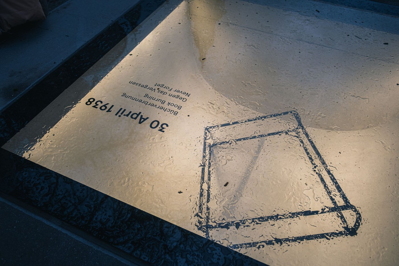 Glass memorial on Residenzplatz commemorating the Nazi book burning of 30 April 1938 in Salzburg