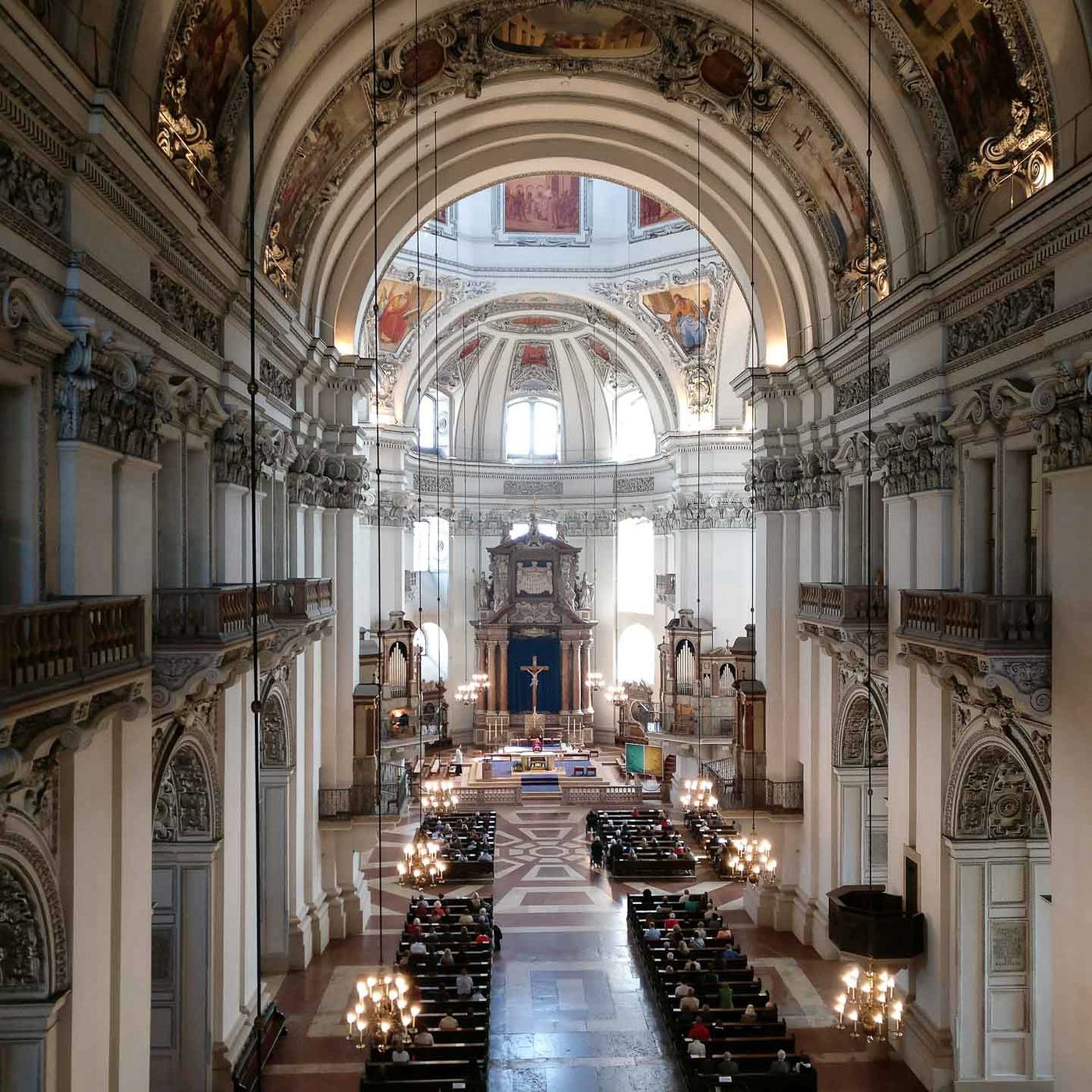 Baroque nave and dome of Salzburg Cathedral seen from the organ loft in Salzburg old town