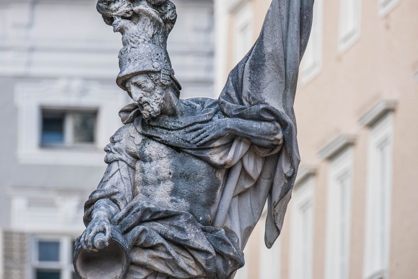 Baroque St Florian statue of the Florianibrunnen fountain on Alter Markt in Salzburg