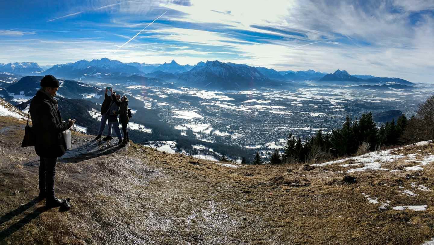 Wide panorama from Gaisberg summit looking toward Untersberg and the Salzburg basin in winter