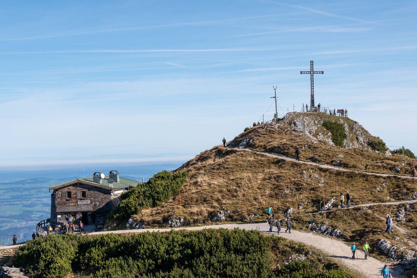 Summit cross and Geiereck mountain hut on Untersberg plateau above Grodig near Salzburg