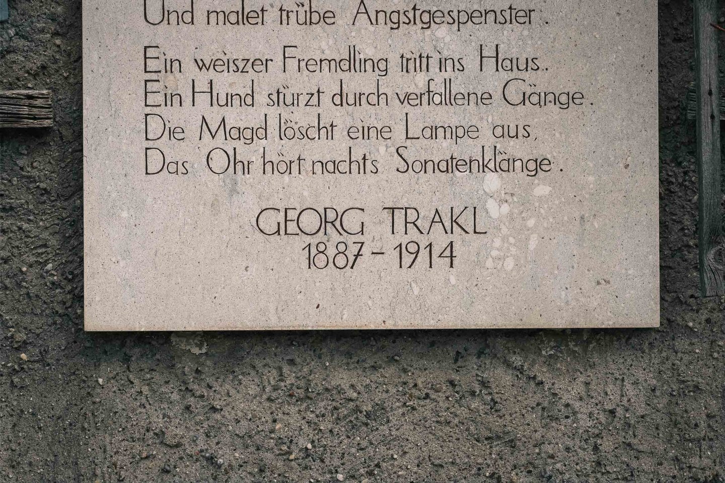 Memorial plaque with a Georg Trakl poem on the wall of the poet birthplace at Waagplatz in Salzburg.