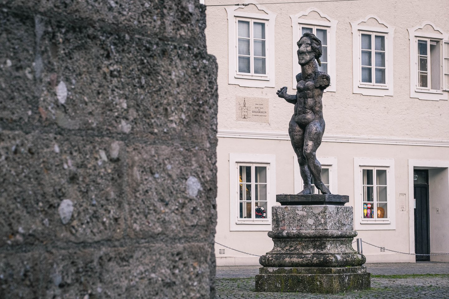 Homage to Mozart bronze figure by Markus Luepertz at Ursulinenplatz courtyard in Salzburg