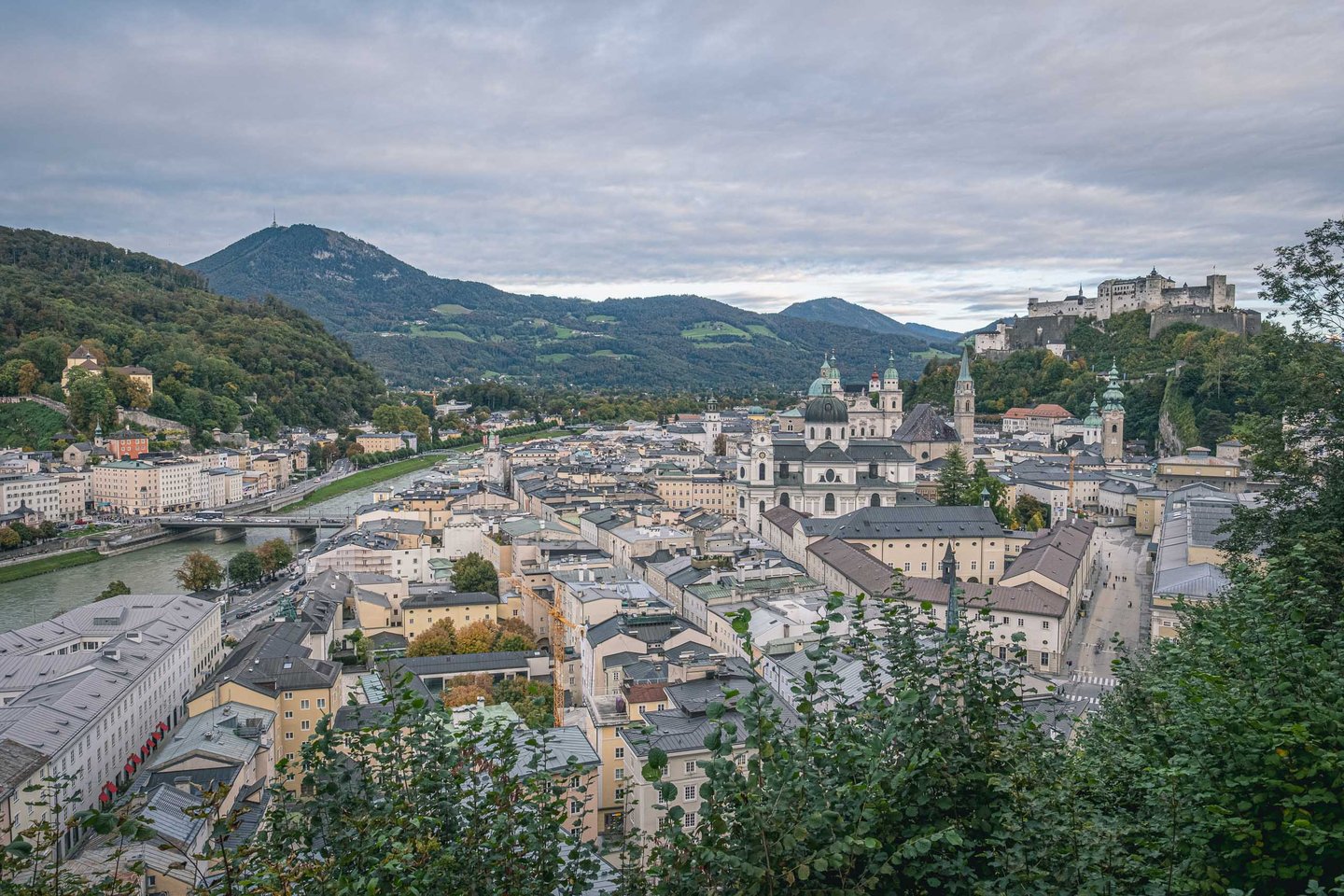 Panoramic view of Salzburg old town with cathedral domes and Hohensalzburg Fortress from Humboldtterrasse on Kapuzinerberg.