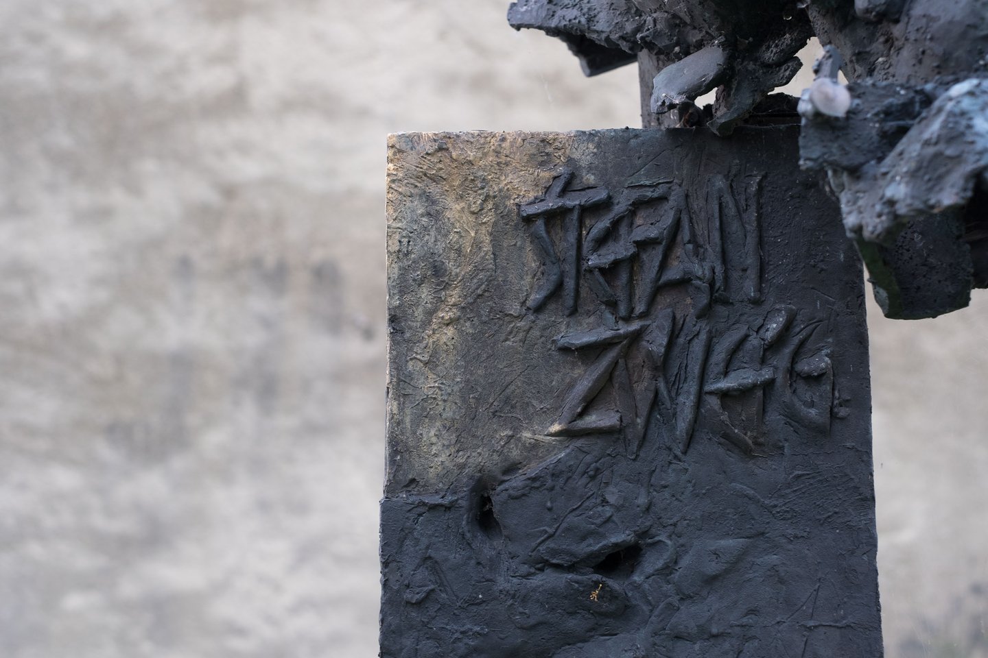 Stone pedestal supporting the Stefan Zweig bust on Kapuzinerberg in Salzburg