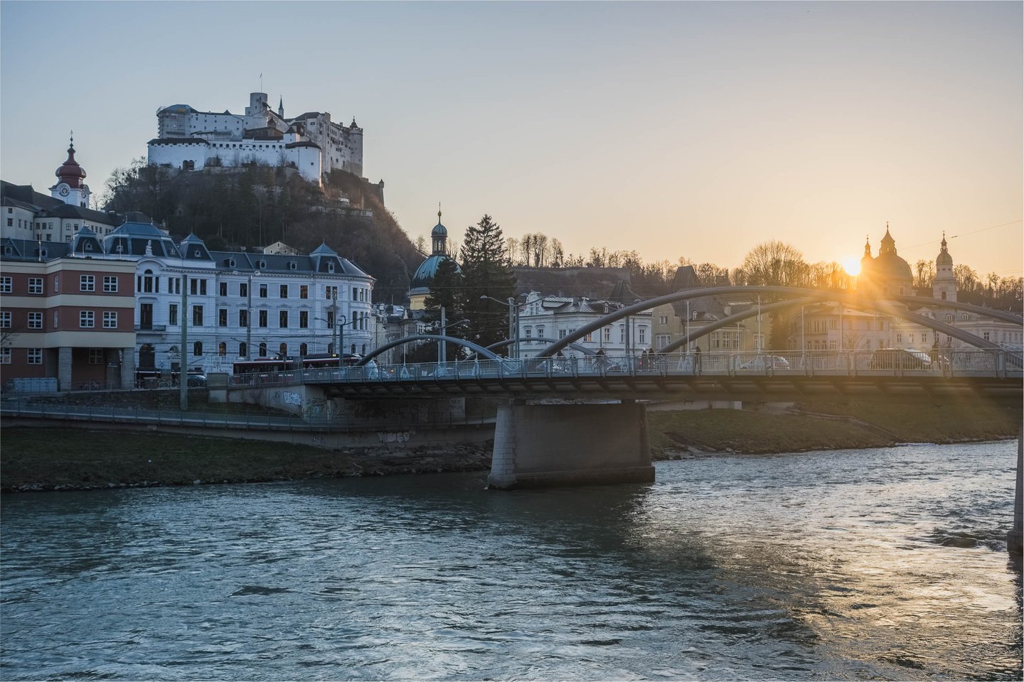 Karolinenbruecke over the Salzach at sunset in Salzburg