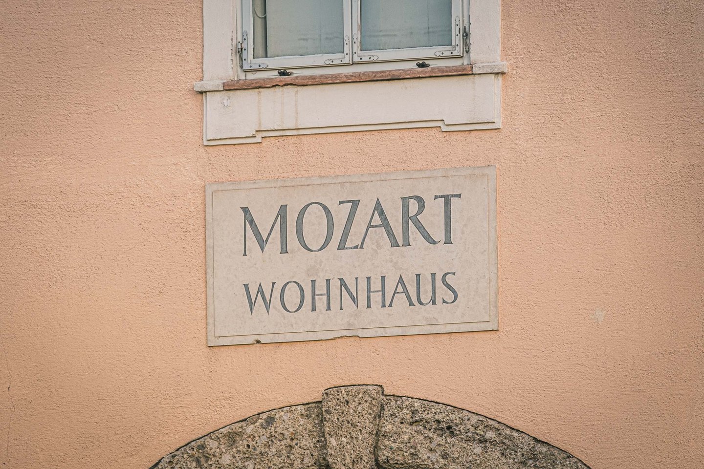 Mozart Wohnhaus stone plaque on facade of Mozart Residence on Makartplatz in Salzburg