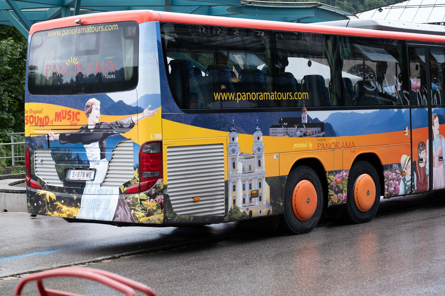 Side view of Panorama Tours Sound of Music bus parked at the Salzbergwerk Berchtesgaden
