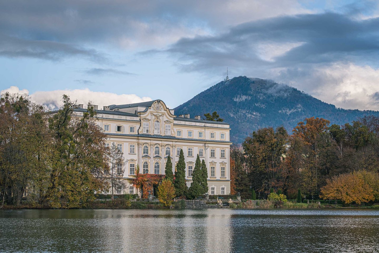 Schloss Leopoldskron reflected in the Leopoldskroner Weiher, the lake terrace that doubled for the back of the von Trapp house