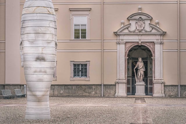 Jaume Plensa Awilda marble head beside Mirabell Palace entrance in Salzburg.