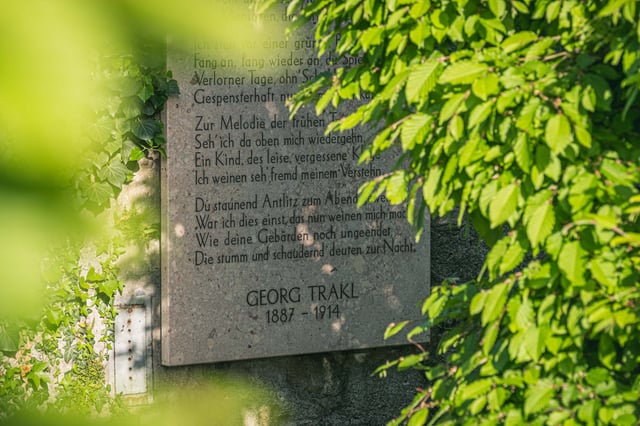 Close view of the Georg Trakl Naturtheater plaque dated 1887 to 1914 in Salzburg.
