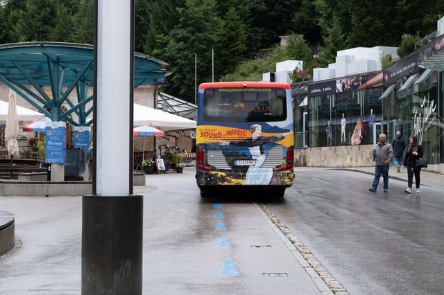 Panorama Tours Sound of Music bus parked at the Salzbergwerk Berchtesgaden visitor area