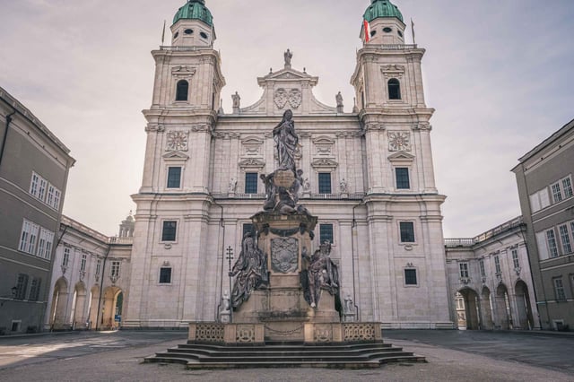 Salzburg Cathedral facade with Mariensaule column and twin towers on Domplatz in Salzburg