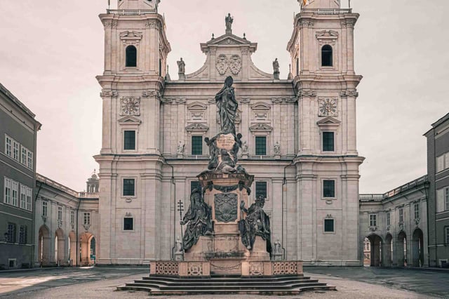 Salzburg Cathedral baroque west facade with Marian column on Domplatz in Salzburg old town